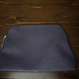Used a few times Nordstrom plum colored make up bag